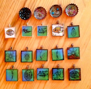 Promotional jewelry for the Chicago Worldcon book launch party of Cat Rambo's Near+ Far, made using Ice Resin and assorted findings.