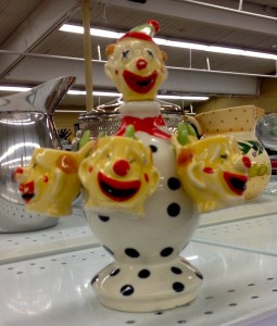 Picture of a teapot shaped like a dead clown.