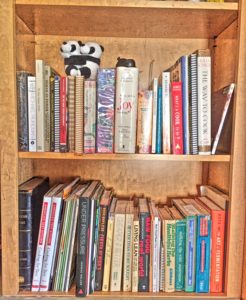 picture of two shelves of cookbooks