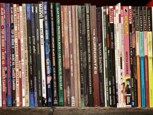 Picture of a bookshelf of graphic novels.